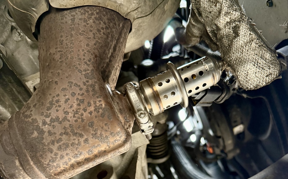 AdBlue dosing injector fitted to the exhaust system of a diesel vehicle