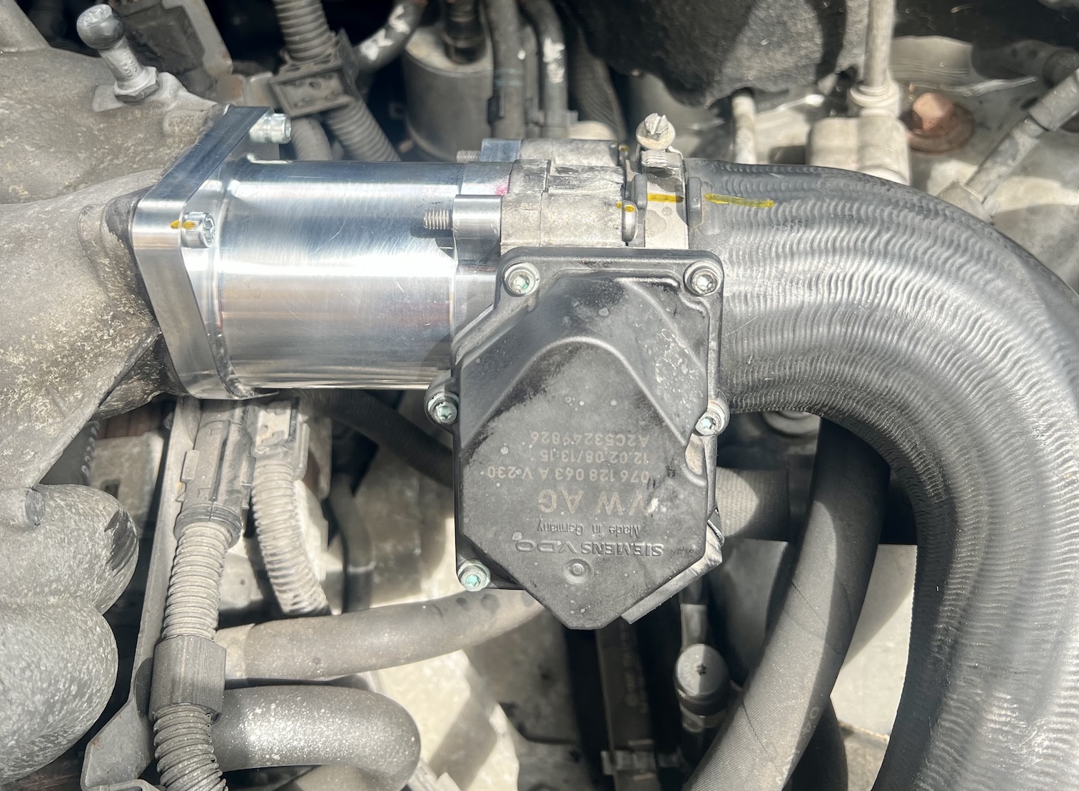 EGR delete block-off plate fitted to a diesel engine