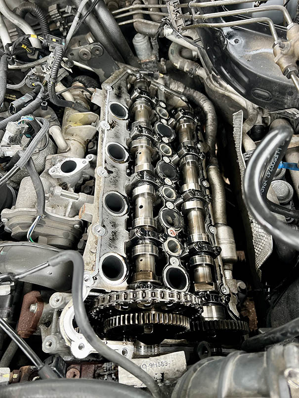 Engine with camshafts exposed during a repair by JSM Diagnostics
