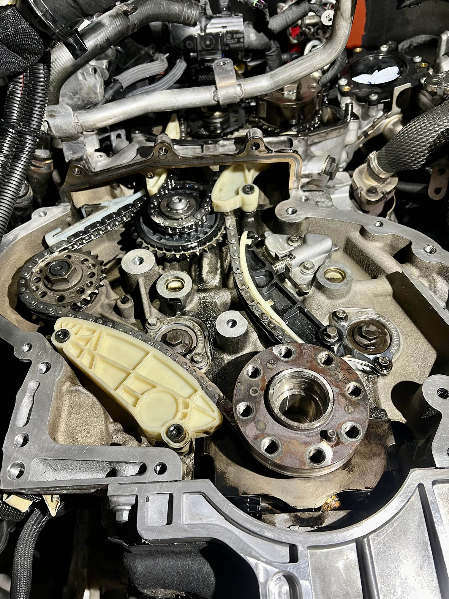 Timing chain assembly with worn guides exposed during replacement by JSM Diagnostics